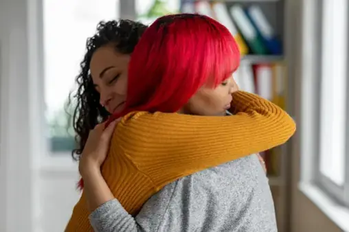 hugs hugging